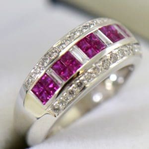 estate levian ring with invisiset rubies and baguette diamonds 4.JPG