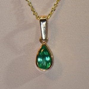 1ct pear colombian emerald pendant bezel set in 18k gold.JPG