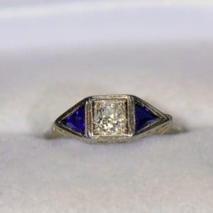 art deco old mine cut diamond ring with triangle sapphire accents.JPG