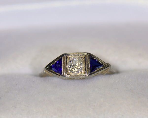 art deco old mine cut diamond ring with triangle sapphire accents.JPG