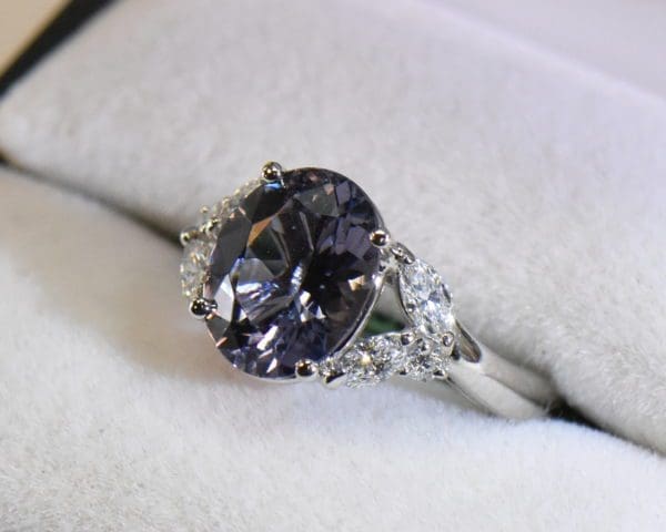 custom platinum ring with color shift violet spinel and diamonds 2.JPG