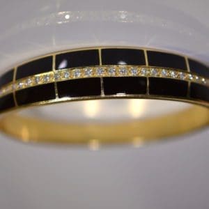 estate solid gold cuff bracelet with diamonds and black enamel.JPG