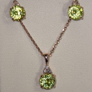 green sphene pendant and earring set in rose gold.JPG
