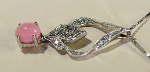 pink conch pearl custom pendant with diamonds 2.JPG
