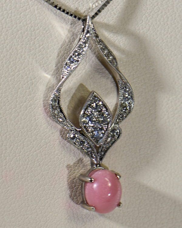 pink conch pearl custom pendant with diamonds 3.JPG