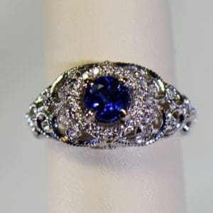 vintage inspired filigree dome ring with round blue sapphire and diamond halo 6.JPG