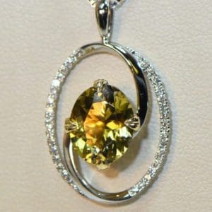 yellow and pink pendant bicolor tourmaline in oval diamond frame 5.JPG