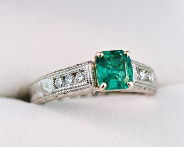colombian emerald and diamond carved engagement ring