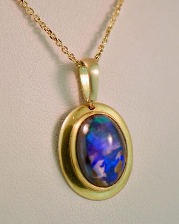 boulder opal pendant in 18k gold frame 3