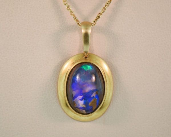 boulder opal pendant in 18k gold frame 4