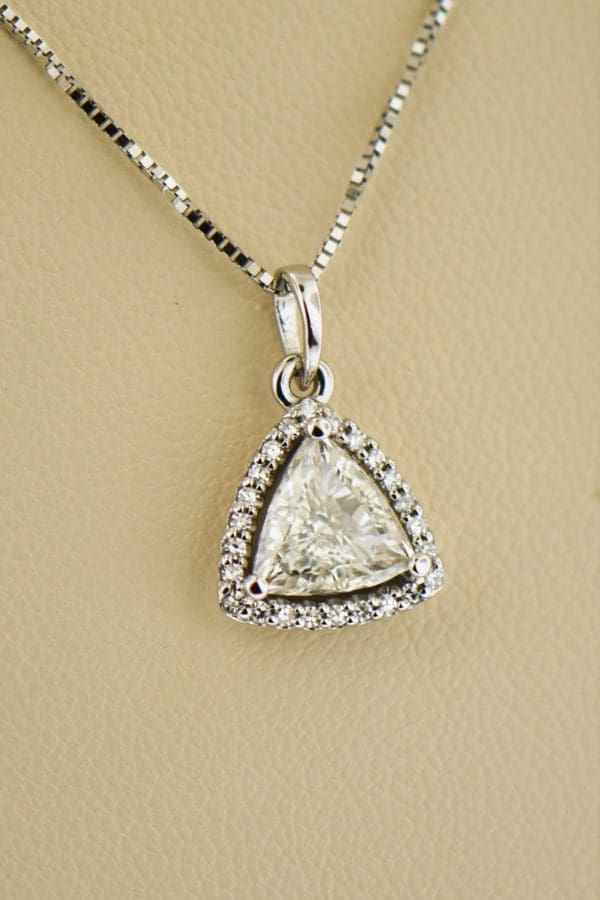 custom triangle pendant with trilliant diamond halo