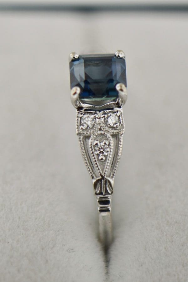emerald cut teal sapphire bicolor engagement ring 4