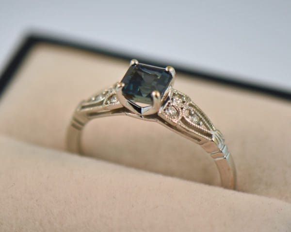 emerald cut teal sapphire bicolor engagement ring 5