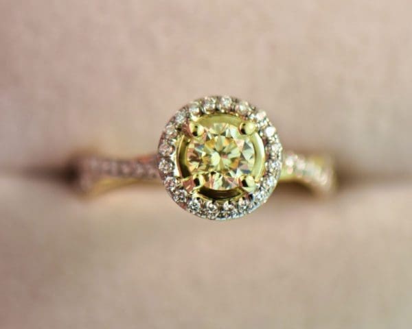 round yellow diamond engagement ring in yellow gold halo mounting 5