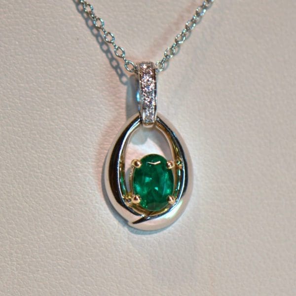 top quality oval natural emerald and diamond pendant white gold 4