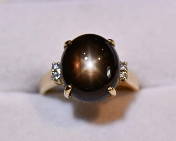 large black star sapphire ladies ring yellow gold 4