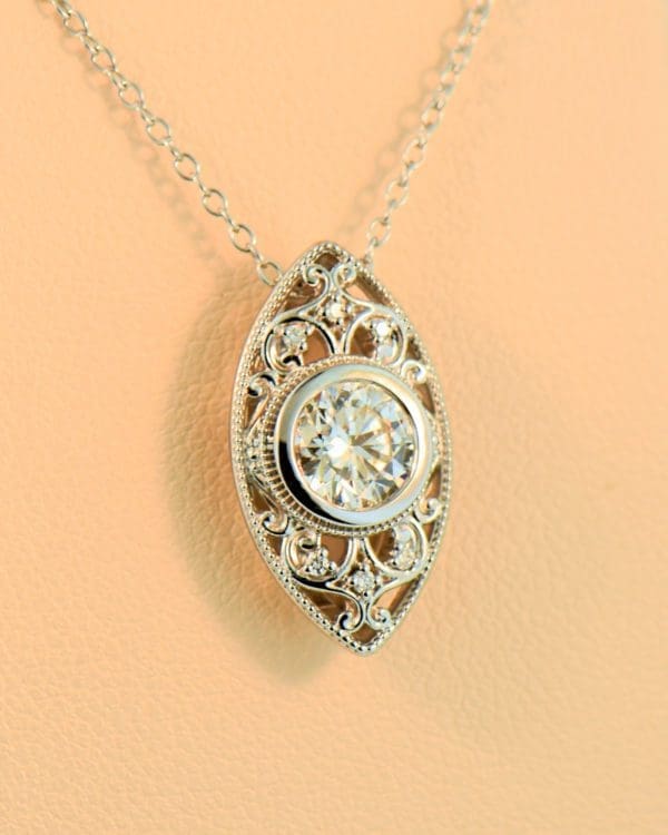 1ct round diamond eye pendant in white gold filigree