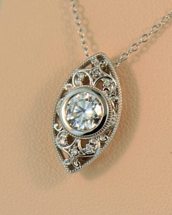1ct round diamond eye pendant in white gold filigree 2