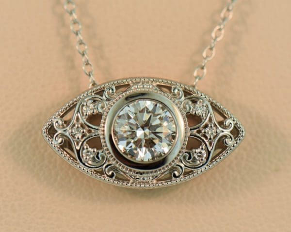 1ct round diamond eye pendant in white gold filigree 4
