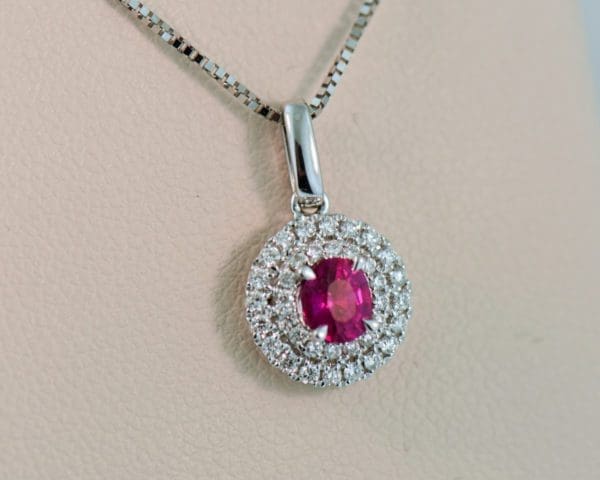 classic ruby and diamond double halo pendant 2