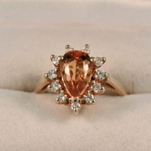 estate pear shape precious topaz and diamond halo ring