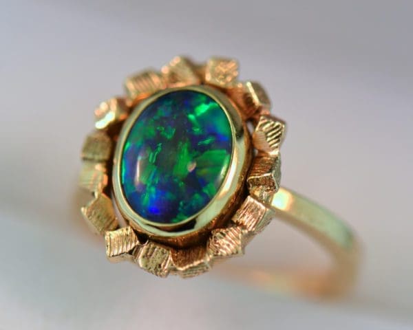 mid century gold and black opal bezel set solitaire engagement ring 3