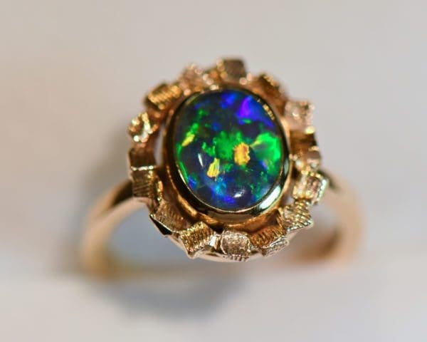 mid century gold and black opal bezel set solitaire engagement ring 4