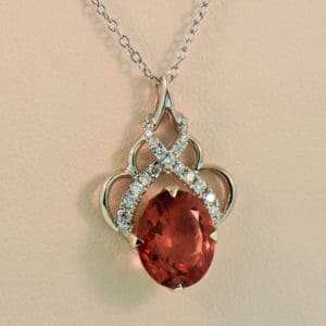 peachy orange oregon sunstone and diamond pendant