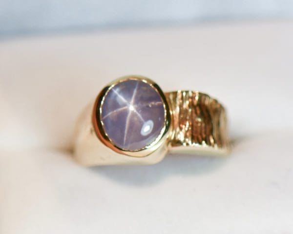 estate unisex ring with lavender star sapphire and textured gold