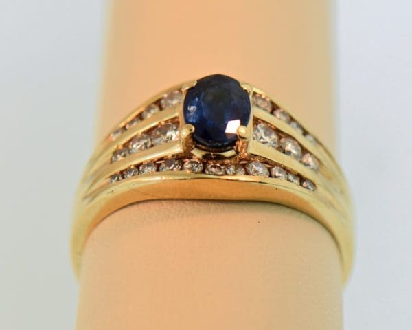 yellow gold channel set diamond and navy blue sapphire estate ring 3