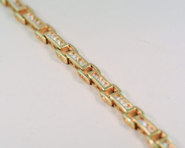 channel set yellow gold and 2ct diamond tennis bracelet