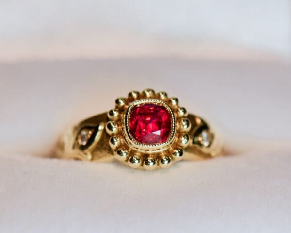 custom carved gold band style ring with bezel set jedi red spinel 2