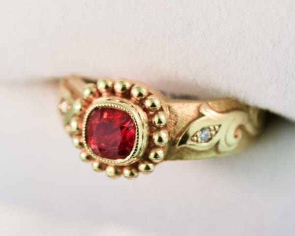 custom carved gold band style ring with bezel set jedi red spinel 4