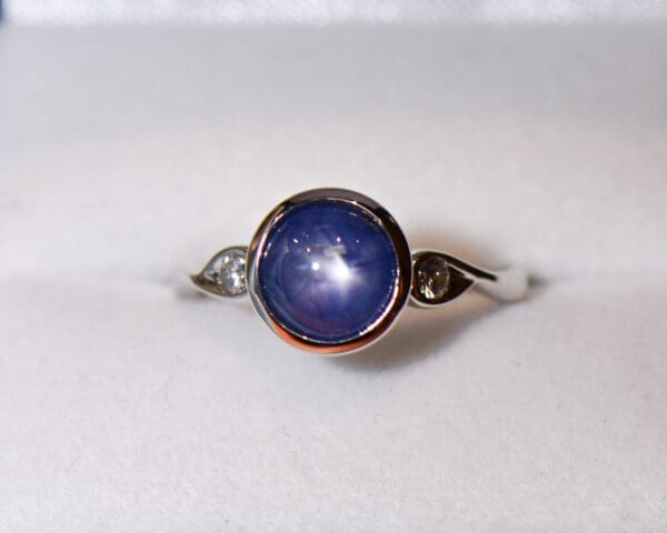 custom round burmese blue star sapphire bezel set engagement ring 5