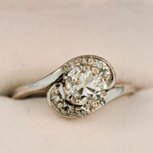 mid century bypass engagement ring set with 1ct old mine cut diamond