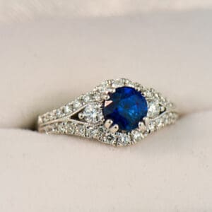 vintage style round blue sapphire and diamond ring white gold