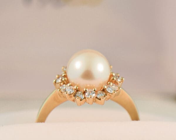 akoya white pearl and diamond halo ring in yellow gold 2