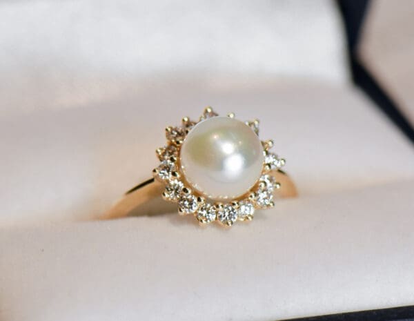 akoya white pearl and diamond halo ring in yellow gold 4