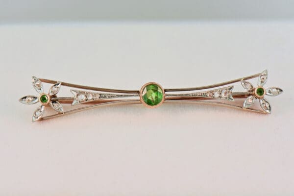 antique russian demantoid green garnet and rose cut diamond brooch