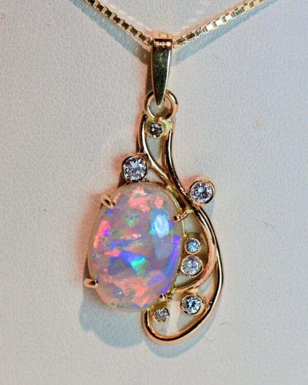 australian 18k freeform pendant with ribbon flash multicolor crystal opal