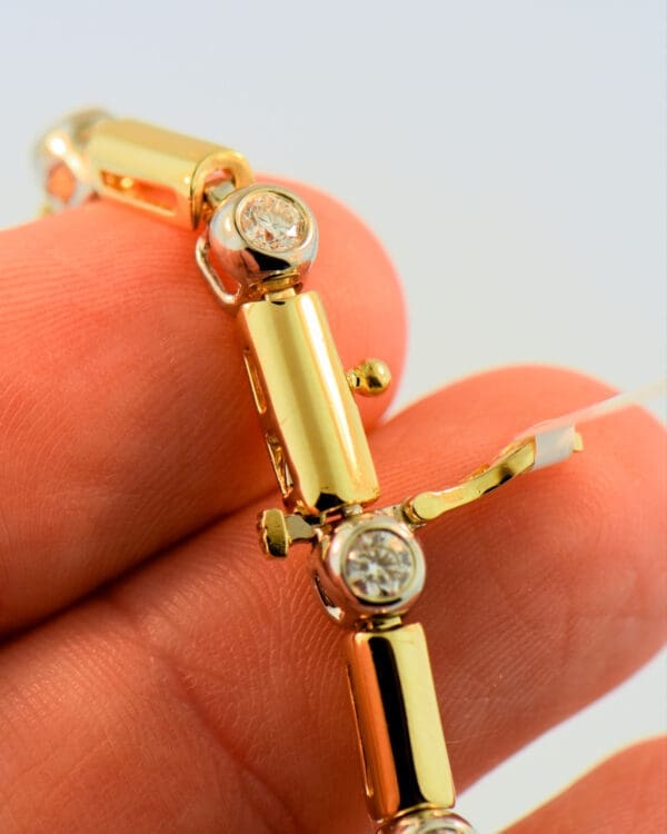 bezel set diamond and gold link twotone tennis bracelet 3