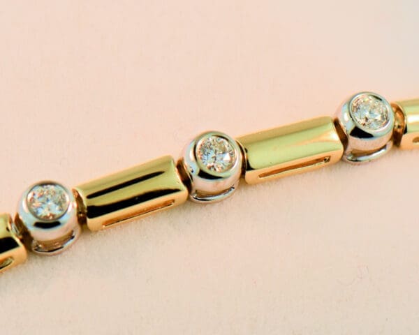 bezel set diamond and gold link twotone tennis bracelet 5