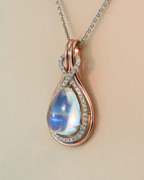 custom rose gold pear pendant with blue moonstone and diamonds 2