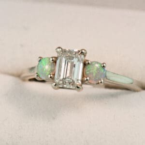 emerald cut lab created diamond and natural opal 3 stone engagement ring