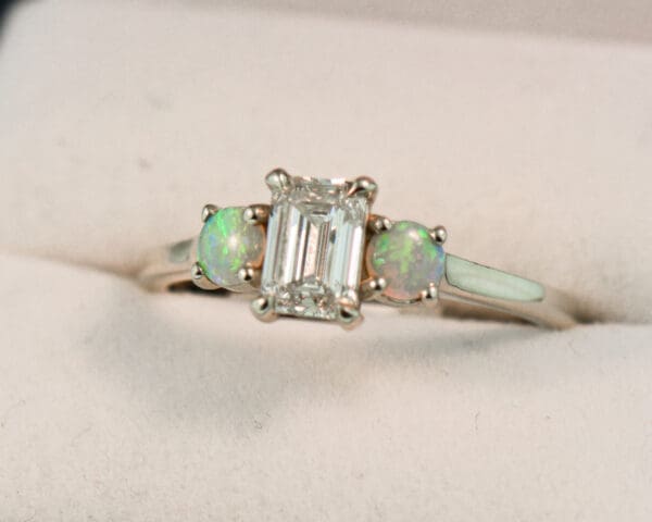 emerald cut lab created diamond and natural opal 3 stone engagement ring