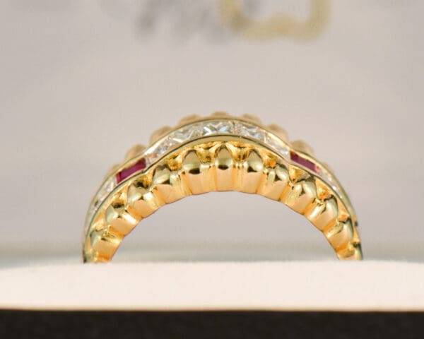 estate yellow gold ring with row of channel set diamonds and rubies 2