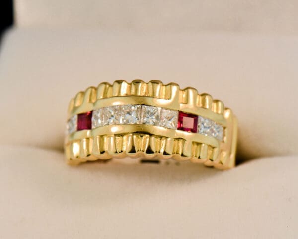 estate yellow gold ring with row of channel set diamonds and rubies 4