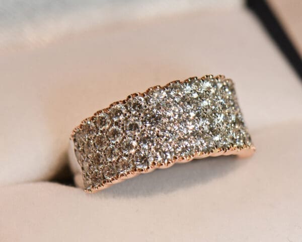 impressive custom pave diamond band in white and rose gold 4