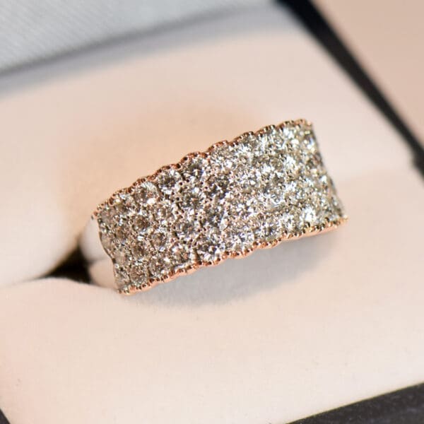 impressive custom pave diamond band in white and rose gold 5