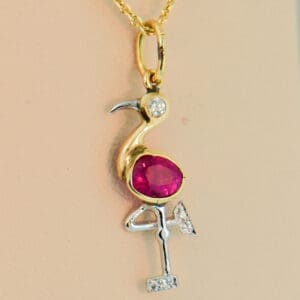 mid century modern pink flamingo pendant with neon pinkish red ruby